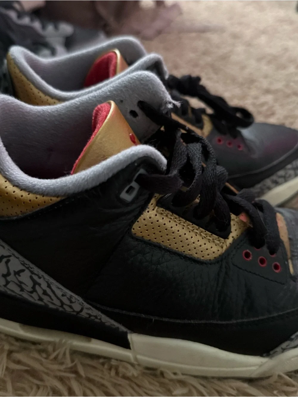 Jordan Men's Black and Gold Low-Top Sneakers with Red Accents